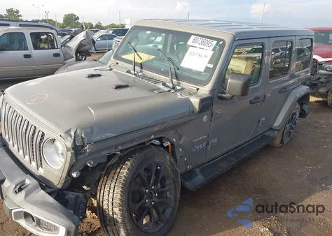 2021 Jeep Wrangler 4Xe Unlimited Sahara 4X4 z USA, uszkodzony, nr VIN 1C4JJXP67MW688912